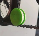 přenosný_olejovač_na_kolo_z_odolného_zeleného_pp_materiálu_3.jpg